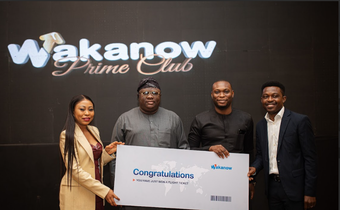 Wakanow Prime Club member beams with excitement after winning the bid for an Air France business class ticket to any destination in Europe during the lively ticket auction at the Wakanow Prime Club launch.