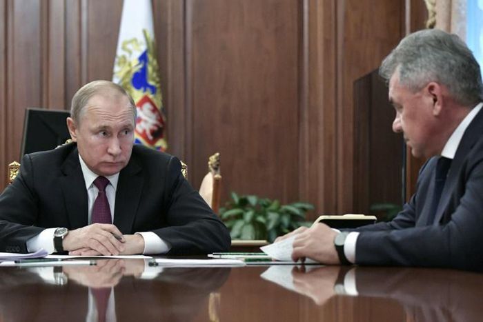 Russia's President Vladimir Putin (L), has approved plans for development of new missiles with Defense Minister Sergei Shoigu