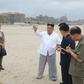 North Korean leader Kim Jong Un (3rd R) visited the resort at least three times last year according to state media