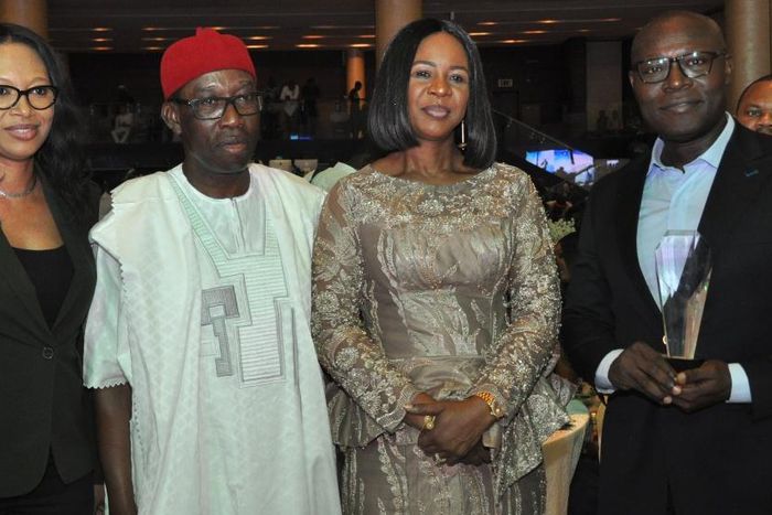 L-R: Mrs. Justina Abdulateef, Globacom's Lagos Public Sector Account Manager, Delta State Governor, Senator Ifeanyi Okowa, his wife, Mrs. Edith Okowa and Mr. Eric Uwaoma, Globacom's Head, Enterprise Sales, displaying the Telecommunications Company of t...