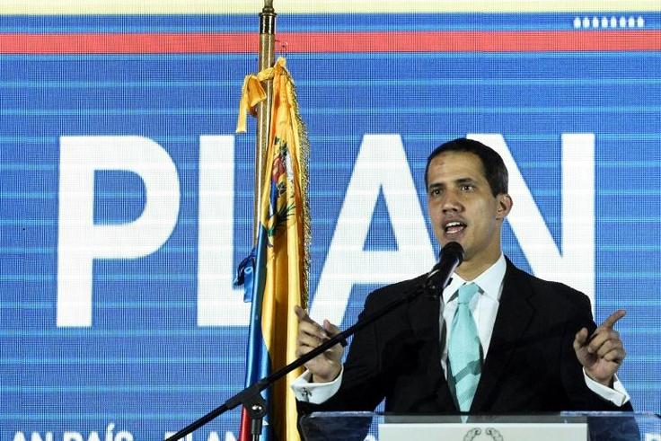 Venezuelan opposition leader and self-proclaimed acting president Juan Guaido presents a plan for his government in Caracas