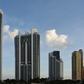 Under the shadow of luxury skyscrapers -- among them Trump Towers, seen here -- Sunny Isles Beach has become a prized destination for well-off foreigners looking to secure US citizenship for their children