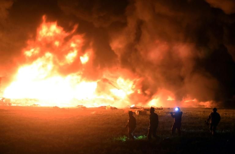 Flames burn at the scene of a massive blaze triggered by a leaky pipeline in Tlahuelilpan, Hidalgo state, on January 18, 2019