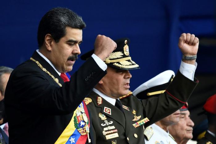 Venezuelan President Nicolas Maduro, seen here with Defense Minister Vladimir Padrino, still has the military's backing
