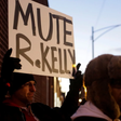 Many protesters positioned themselves in front of Sony Music’s New York City headquarters on Wednesday to ask the label to drop R. Kelly. [Joshua Lott/Reuters]
