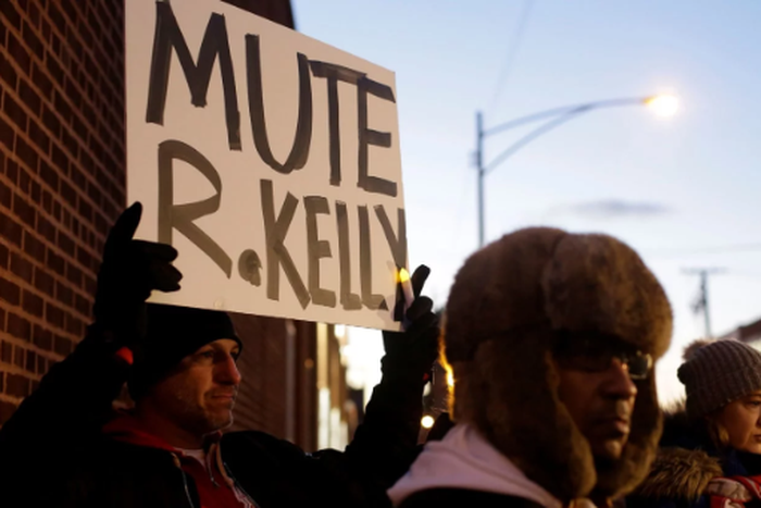 Many protesters positioned themselves in front of Sony Music’s New York City headquarters on Wednesday to ask the label to drop R. Kelly. [Joshua Lott/Reuters]