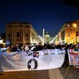 Members of Ending Clergy Abuse, a global organization of prominent survivors and activists who are in Rome for the papal summit on the sex abuse crisis within the Catholic Church, hold a cross during a protest by the Castel Sant'Angelo in Rome