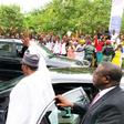 Buhari waving to supporters at a recent visit to Lagos, the commercial nerve centre