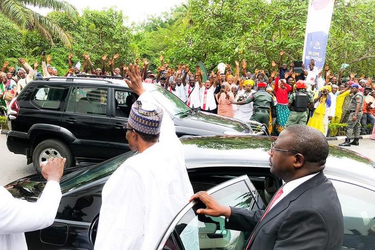 Buhari waving to supporters at a recent visit to Lagos, the commercial nerve centre