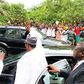 Buhari waving to supporters at a recent visit to Lagos, the commercial nerve centre