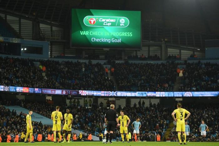 The referee waits for the VAR replay before awarding the third goal in Manchester City's 9-0 thrashing of Burton Albion