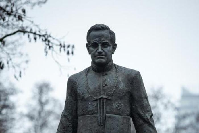 Video footage on social media showed men using a rope to topple the statue of Father Henryk Jankowski, pictured December 2018 after it was vandalized with paint over the accusations against him of paedophilia