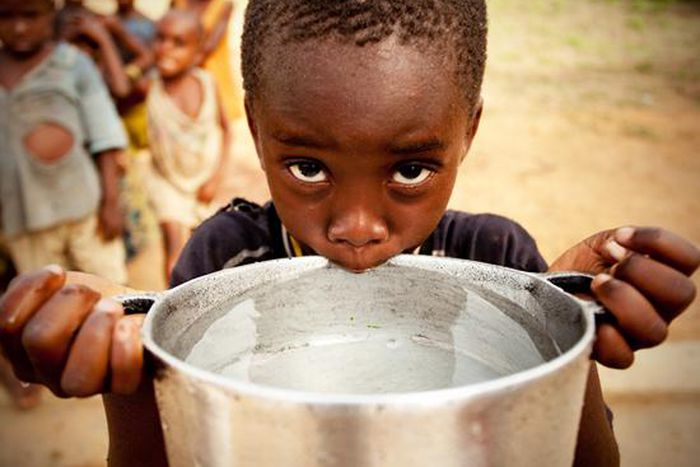 Boy drinking lots of water [rhino africa blog]