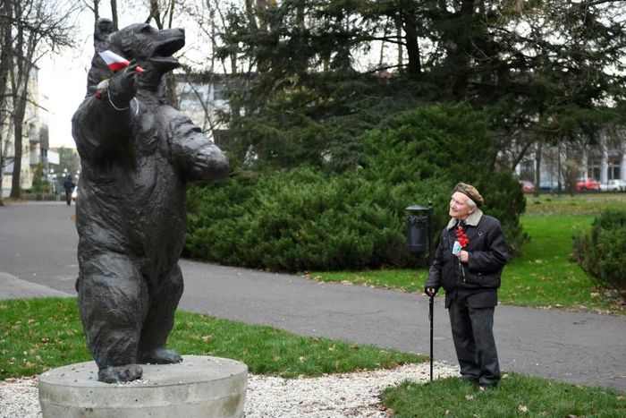 93-year-old former Polish soldier Wojciech Narebski with a monument to 'Corporal' Wojtek the bear, his wartime comrade in arms
