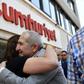 Cumhuriyet chairman Akin Atalay greets friends after being released from prison in April last year