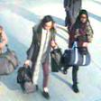 Shamima Begum, right, is shown here at Gatwick Airport along with two classmates who joined IS in Syria in 2015