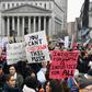 Hundreds of protesters gathered for the Women's Unity Rally at Foley Square in New York City, while a breakaway group rallied elsewhere in the city