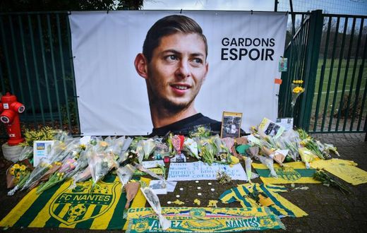 Fans place tributes to Argentinian forward Emiliano Sala outside the Nantes training ground in France. The player had signed for Cardiff City in the English Premier League and his plane went missing on a flight to join his new club