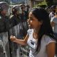 National guard members seen in Caracas as supporters of opposition leader Juan Guaido hand out leaflets offering amnesty to members of the military who defect to his camp