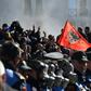 Two police officers were hospitalised and four demonstrators had to be treated for breathing problems