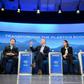 Coca-Cola CEO James Quincey (2L) and PepsiCO CEO Ramon Laguarta (R) participate in a panel discussion on reducing plastic waste during a session of the World Economic Forum in Davos, Switzerland