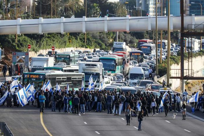 Israelis of Ethiopian origin block Tel Aviv highway as they protest against police violence and racism after an officer shot a young community member dead