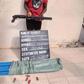 The police alongside local vigilantes, were able to seize a combat weapon found in a lady's possession. She reportedly hit it cleverly close to mopping stick. [Instagram/Instablog9ja]