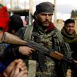 Fighters with the US-backed Syrian Democratic Forces (SDF) in the frontline village of Baghouz where they are fighting against the last shred of the Islamic State (IS) group's "caliphate"