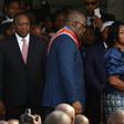 Kenya's Uhuru Kenyatta, seen next to Felix Tshisekedi at the latter's inauguration last month, offered to share lessons learned from his own country's past political tensions as Tshisekedi looks to forge DR Congo's future after his disputed poll win