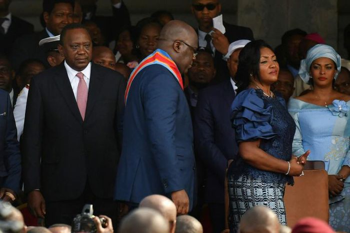 Kenya's Uhuru Kenyatta, seen next to Felix Tshisekedi at the latter's inauguration last month, offered to share lessons learned from his own country's past political tensions as Tshisekedi looks to forge DR Congo's future after his disputed poll win