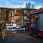 Firefighters rescued three people from the rubble of the house and were working to free a fourth