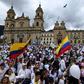 Thouusands march to condemn the Bogota police academy car bombing that killed 20 students