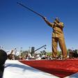 Sudan's President Omar al-Bashir speaks during a rally with his supporters in the Green Square in the capital Khartoum on January 9, 2019