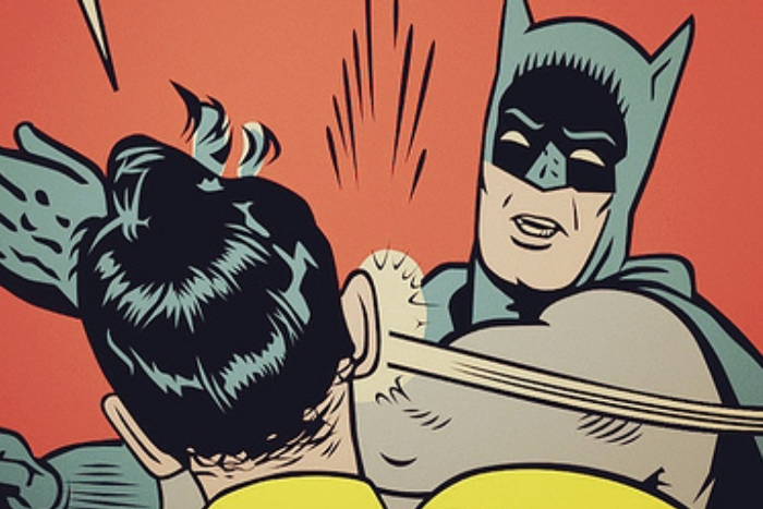 Nigerian policeman reportedly slaps civilian in a bank. (The Coli)