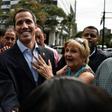 Venezuelan opposition leader and self declared acting president Juan Guaido greets supporters at a demonstration called by supporters in the transportation sector, in Caracas on February 20, 2019