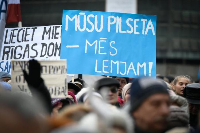 'Hands off our Mayor Usakovs' read placards at the demonstration supporting Riga's pro-Kremlin chief