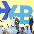 Ruler of Dubai Sheikh Mohammed bin Rashid Al-Maktoum (2-L), and the Emirate's Crown Prince Sheikh Hamdan bin Mohammed bin Rashid Al-Maktoum (3-R), participate in ceremony to present the new logo of Dubai International Airport on February 13, 2019