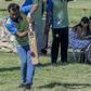 Watched by Uruguayans drinking their traditional mate infusion, an Indian cricketer plays a stroke on a makeshift pitch in a park in Montevideo