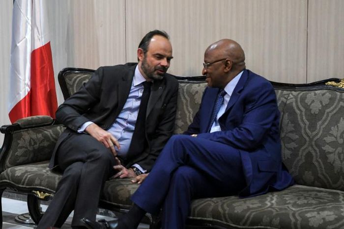 Philippe (L) spoke with his Malian counterpart Soumeylou Boubeye Maiga on arrival at Bamako's airport