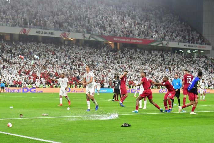 Home fans threw bottles and sandals as Qatar beat UAE in their Asian Cup semi-final