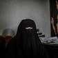 A French women detained after leaving the Islamic State group's last holdout speaks to a AFP reporter at al-Hol camp for displaced people in northeastern Syria on February 17, 2019