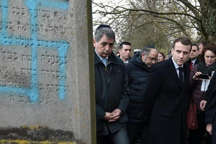 President Macron visiting the vandalised Jewish cemetery in Quatzenheim