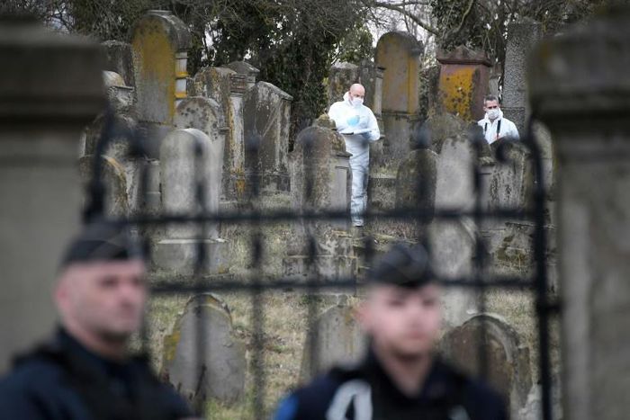 Around 80 graves were discovered to have been daubed with swastikas at a Jewish cemetery in France
