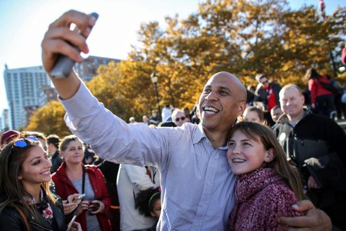 US Senator Cory Booker, seen here taking a selfie, is the latest Democrat to seek the 2020 presidential nomination