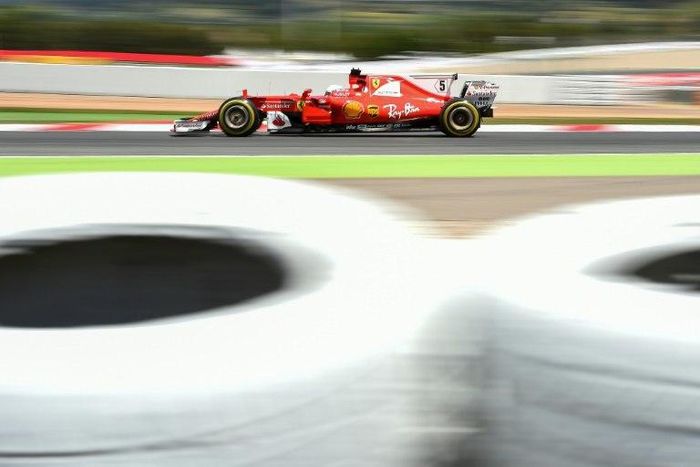 Ferrari's driver Sebastian Vettel drives at the Circuit de Catalunya on May 14, 2017