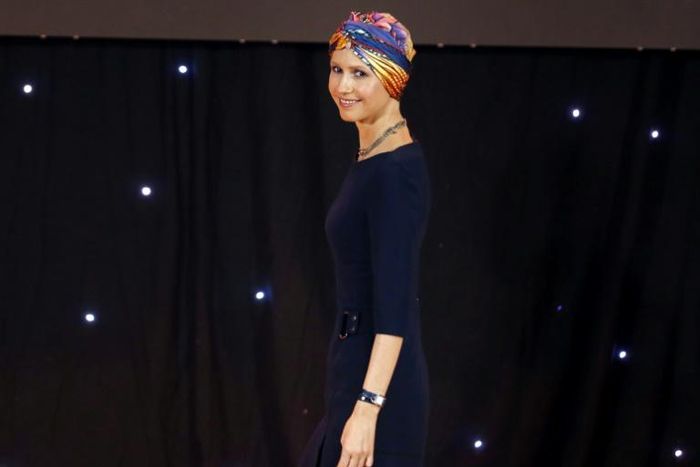 Syria's first lady Asma al-Assad takes part in a graduation ceremony of future teachers of a Syrian Organisation for Persons with Disabilities, in this file picture taken on December 3, 2018