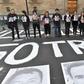 Members of the press hold images of colleagues during a protest against the murder or disappearance of journalists and photojournalists in Mexico, in front of the National Palace in Mexico City on June 1, 2018