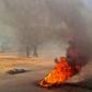 Sudanese protesters burn tyres during an anti-government demonstration on January 18, 2019 in the capital Khartoum