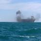 Iran's elite Revolutionary Guard attacks a vessel during a previous drill in the Strait of Hormuz in 2015