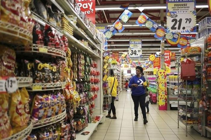 A customer shops at a Shoprite store in Johannesburg, in a file photo. REUTERS/Siphiwe Sibeko